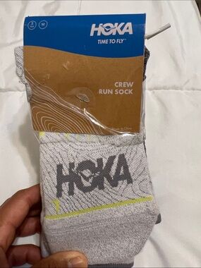Hoka Women’s  Crew Run Socks in Light Gray with Yellow Trim. 3 pair